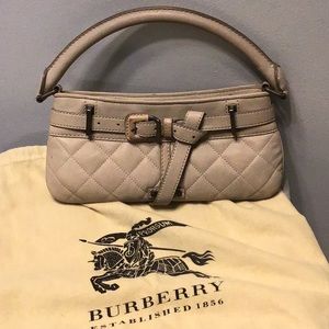 Authentic Burberry shoulder bag in great condition. Tan grayish color